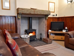 Traditional and warm living and dining room with wood burner | Lealholme, Bassenthwaite, near Keswick