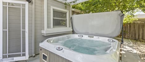 Enjoy our hot tub on a nice summer evening or cold winter night!