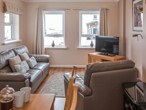 Living room | Kittiwake Cottage - Celtic Haven Resort, Lydstep, near Tenby