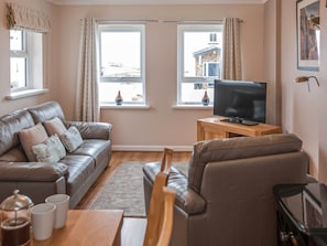 Living room | Kittiwake Cottage - Celtic Haven Resort, Lydstep, near Tenby