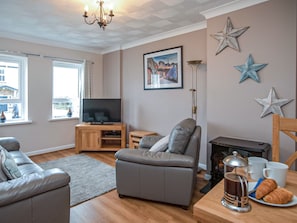 Living room | Kittiwake Cottage - Celtic Haven Resort, Lydstep, near Tenby