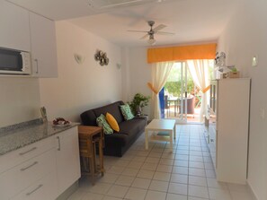 Open plan kitchen with living room.