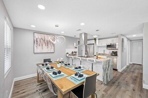 The open concept of our beautiful dining area and modern fully equipped kitchen. Cherish wonderful memories with family and friends while on vacation. If you like this minimalist setup, don't hesitate to send us a message now!