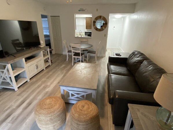 Cozy living room with 60 inch tv and all new furniture 