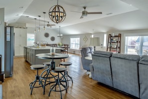 Enter into the open floor plan with updated kitchen, living, and family room.
