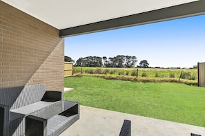 Ideal for BBQs or simply relaxing with a drink while soaking up the views, the open green space is peaceful 
