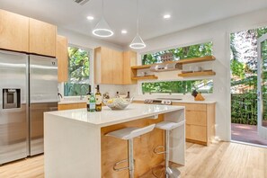 Beautiful modern kitchen with all of the appliances and kitchen essentials for your stay!