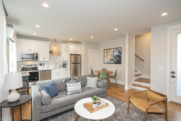 First floor living room, dining room, and fully stocked kitchen!