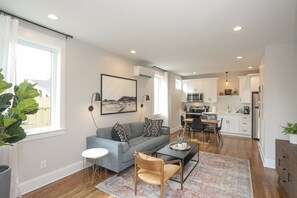 First floor living room, dining room, and fully stocked kitchen! 