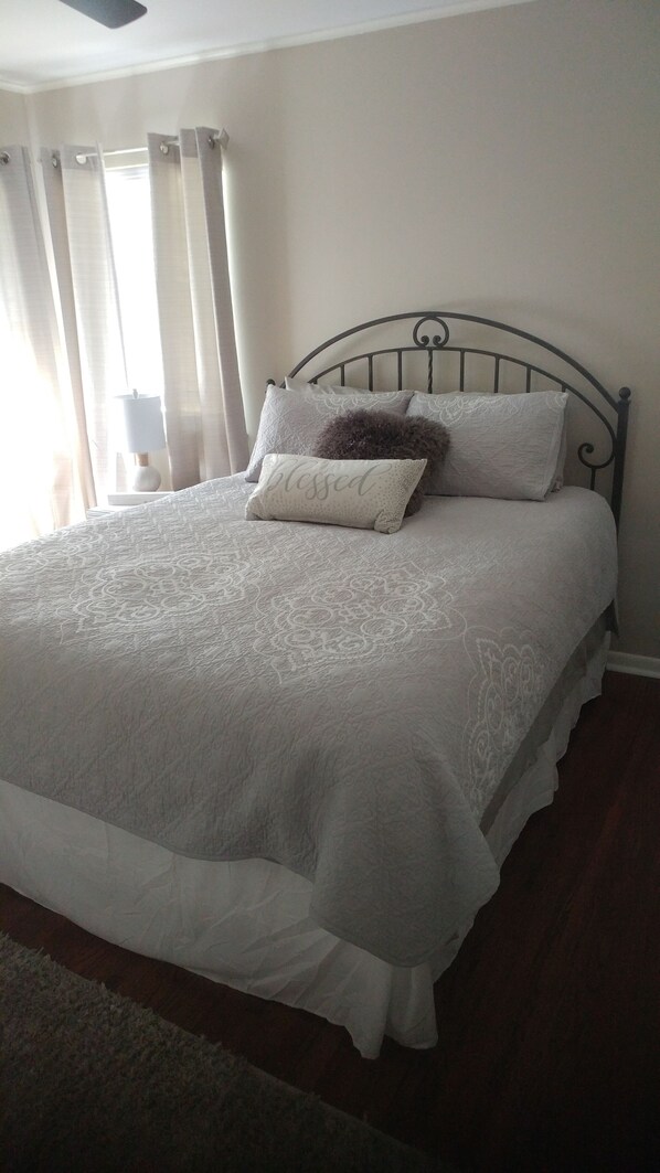 Master bedroom with queen bed