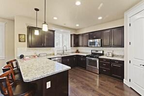 Imagine yourself cooking in this modern kitchen.