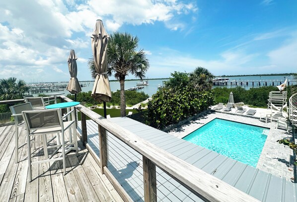 Take it all in. Beautiful rooftop deck overlooking the water as well as the pool