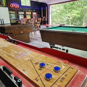 Games in the garage. Pacman, Asteroids, pool, foosball, shuffleboard