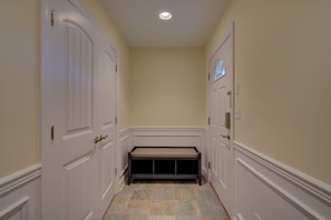Dupont Street entry foyer with beach items closet
