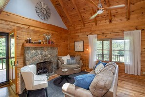 Great Room with Stone Fireplace, Huge Windows framing Mountain and Valley Views!