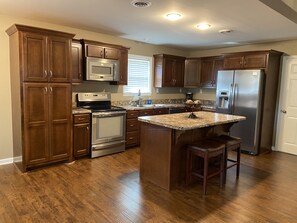 Fully stocked kitchen and island