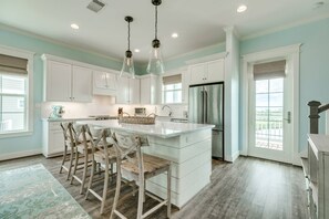 Kitchen has access to back deck with gorgeous views!