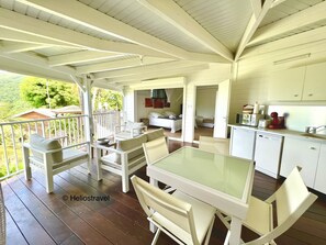 The living room and the sheltered terrace