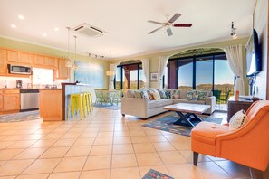 Spacious interior with filled with natural light and warm colors for a homey feel!