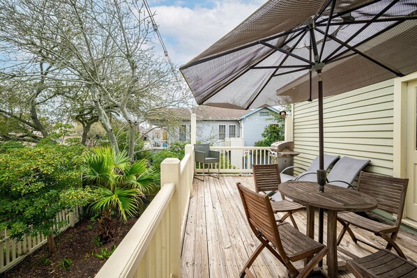 Porch with lounge chairs.