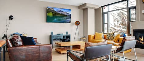 Private ski-in/ski-out condo at Lowell Condominiums in the base area of Park City Mountain Resort. rug, and wall mounted flat screen TV