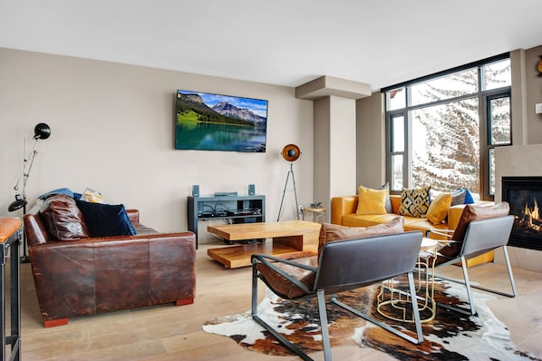 Private ski-in/ski-out condo at Lowell Condominiums in the base area of Park City Mountain Resort. rug, and wall mounted flat screen TV