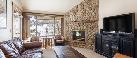 River rock fireplace in the living room