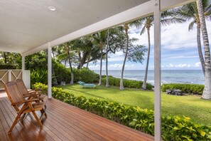 Lanai facing beautiful yard and ocean.
