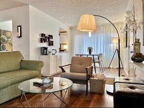Living room, looking into Dining area and coffee bar. 