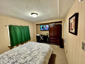 Queen Bed, Smart TV, Dresser, Desk, Portable fan/ heater. 