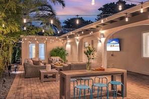 Surf Key features three bedrooms, a hot tub and grand outdoor lounge area.