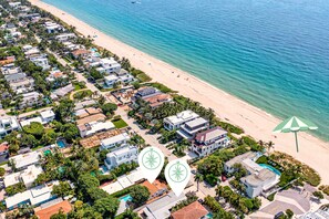 TWO neighbouring houses, ONE Property! Many amenities, including a Heated Pool, and 2 Hot Tubs, Game Room just steps away from the beach