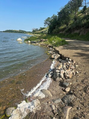 Shallow entry kayak/swim area at end of path. We recommend water shoes.