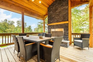 The outdoor fireplace is perfect for happy hour at the end of a fun filled day.