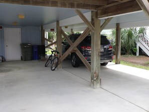 Plenty of room for parking. 3 cars of average size. Have outside shower.