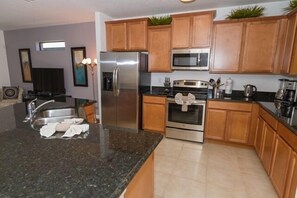 Fully equipped kitchen with modern appliances