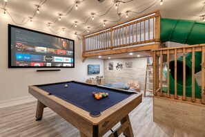 Ultimate Game Room: PS5, Fire TV Projector, Playground, Pool Table.
