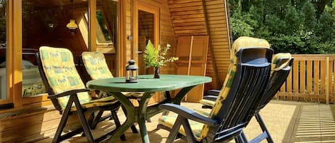 Property, Furniture, Table, Plant, Wood, Outdoor Furniture, Shade, Outdoor Table, Building, Interior Design