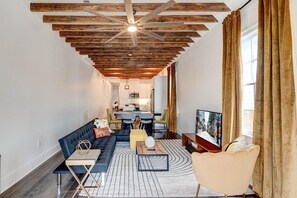 Incredible exposed beams in this historic New Orleans home | Living room