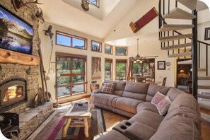 Spacious sectional in front of the fireplace