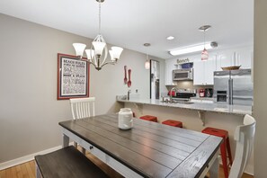 Plenty of seating around the dining table & counter