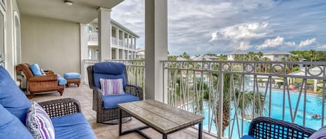 Welcome to "Isle Be Back!" 30A Seacrest Beach Condo with large Poolside Balcony!