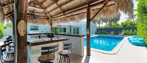 Newly renovated 4 Bed/ 3 Bath Saltwater Pool home beautifully decorated and located in a sought after location in Palm Beach Gardens. To top it off, there is an amazing Tiki Bar & Fire Pit!