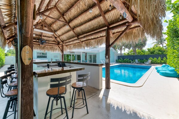 Newly renovated 4 Bed/ 3 Bath Saltwater Pool home beautifully decorated and located in a sought after location in Palm Beach Gardens. To top it off, there is an amazing Tiki Bar & Fire Pit!