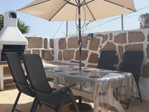 Dining area and BBQ on the top terrace