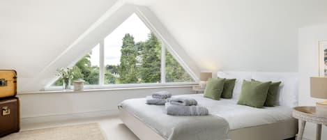 First floor: The stunning master bedroom with feature window