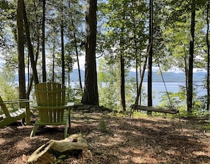 summer view of the Adirondack mountains from Adirondack chairs