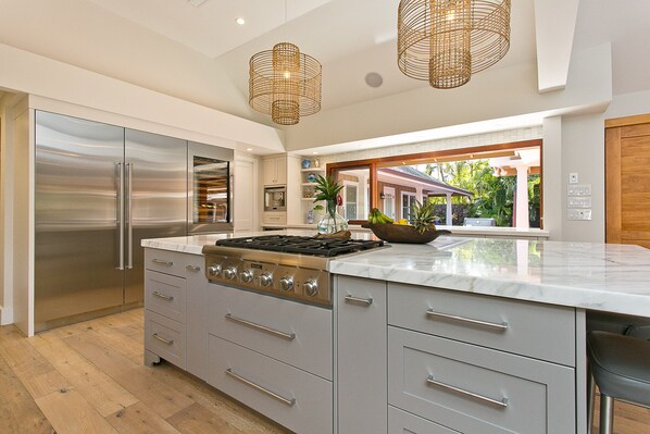 Chef's kitchen with Thermador and Sub Zero Appliances
