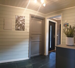 Hall, entrance to the bathroom and exit
