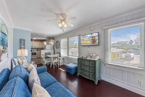 Unit 110A is a cute coastal cottage located on the second floor